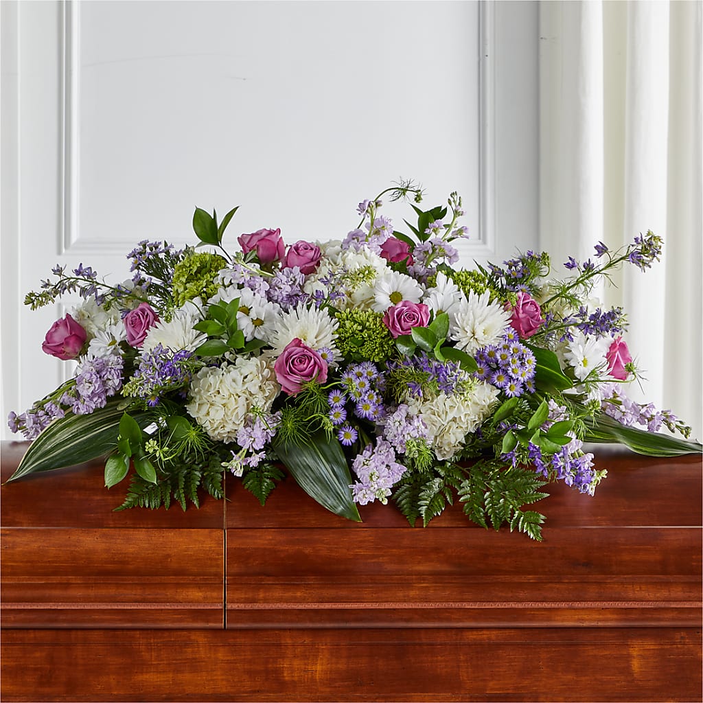 Meadows of Serenity Casket Spray – Blossoms In Studio Of Flowers, Forest MS